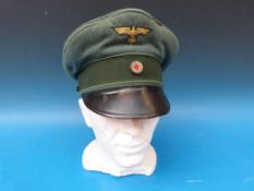 A German Coastal Artillery peaked cap with LLD logo to inside