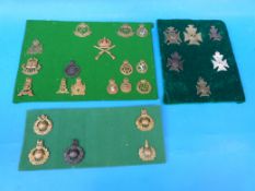 Twenty-six British Army badges including Royal Marines, Army Educational Corps, ATS, Military