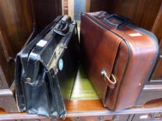 A vintage leather briefcase and one other
