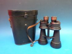 A pair of German WWII era Carl Zeiss BEH 7x50 binoculars with bronze adjustable eye pieces, stamped