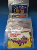 A collection of largely tea cards in books, together with some Grandee, Vintage Mars Confectionery