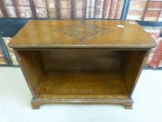 A small carved oak bookcase (H 38cm x L 50cm)