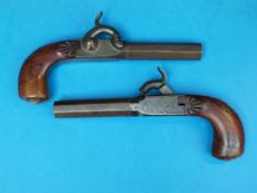 A pair of 19thC percussion pocket pistols with inlaid wirework handles, engraving to locks, dolphin