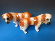 A pair of St. Bernard ceramic dogs c1920 with glass inset eyes