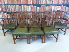 Eight carved mahogany leather seated chairs includes two carvers