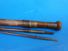 An anonymous vintage trout fishing rod (wood construction) in three pieces