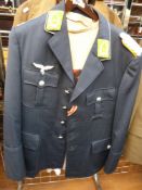 A quantity of replica German and other clothing to include Luftwaffe jacket, fabric badges etc
