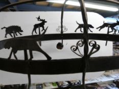 A hunting related blacksmith-made hanging utensil rack