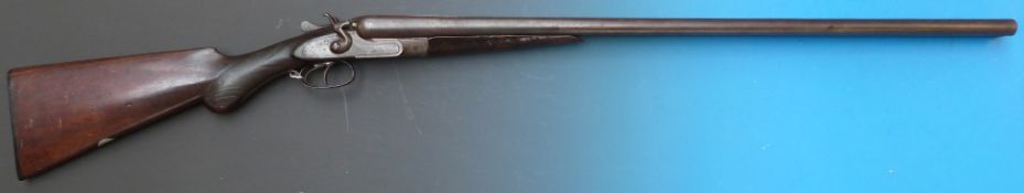 W Jeffery 12 bore double barrelled side by side hammer action shotgun, the semi-pistol grip stock