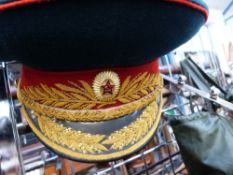 A tank commander's helmet with intercom by Racal in bag, together with a Russian military uniform
