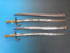 A pair of 1871 pattern bayonets in sheaths
