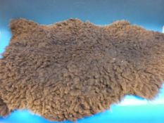 Five various sheepskin rugs (Approx lengths 110cm)