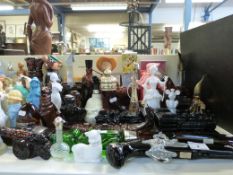 A large collection of Avon perfume bottles