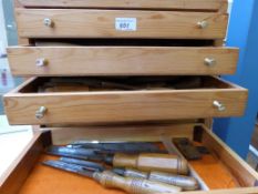 A tool chest containing approximately 60 Marples and other wood carving chisels etc, many stamped