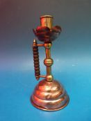 An Arts and Crafts beehive candlestick by Dr Christopher Dresser, probably for Barnum and Froud.