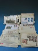 A large quantity of GB First Day Covers and mint stamps