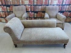 An upholstered chaise longue and two similarly upholstered armchairs