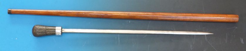 A late 19th/early 20thC sword stick with riveted white metal collar