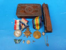 A group of three WWI medals including a 1914 Star awarded to 42774 Gnr F Sheppard, RFA, a 1914