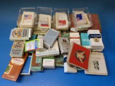 A collection of cigarette boxes including Turf, Army Club and Wills, together with an album of