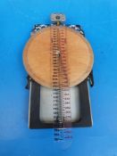 A cased Air Ministry course and speed calculator marked IIA HTA (1928)