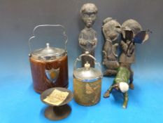 A collection of treen including carved figures signed M Ortin verso, a biscuit barrel and an