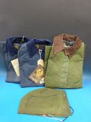 Three Belstaff waxed jackets, two navy and size 10, one green with hood and size 14, unused in
