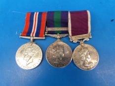 A WW2 trio to 22212453 WO CL1 LA Hoyes Royal Signals, includes 1939-45 medal, GSM Cyprus and LSGC