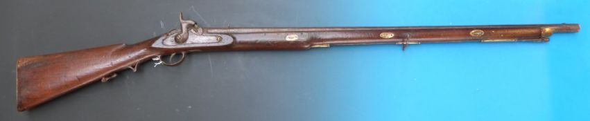 A 19thC continental percussion musket with crown cypher to lock and captive ramrod (137cm long