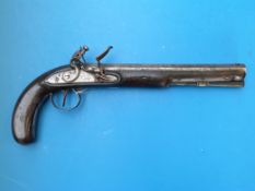 A Wogdon flintlock duelling pistol with engraved mounts and butt plate, octagonal barrel and