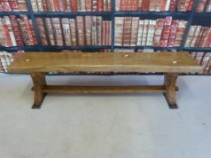 A bespoke elm bench or hall seat in the Arts and Crafts manner (L 150cm)