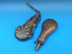 Two powder flasks, the copper example marked Dixon & Sons to neck