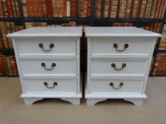 Two painted pine bedside chests of drawers