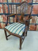 A set of six upholstered mahogany dining chairs