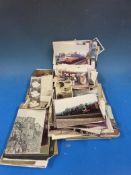 A quantity of postcards and photographs including black and white examples, railway and steam