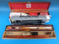 Three 12 bore boxed cleaning kits and rifle scope 3-9x40