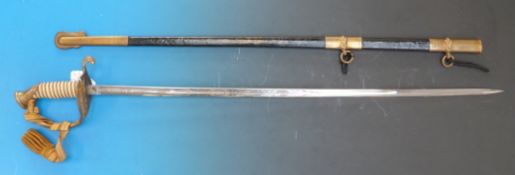 A 20thC US Navy officer's sword with wire-bound shagreen handle and pierced and cast guard, the