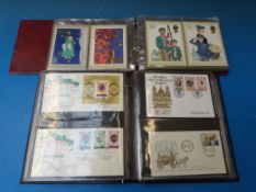 An album of PHQ cards and an album of Colonial first day covers