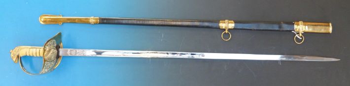 A Burberry RAF dress sword in leather and gilt scabbard