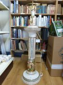 A continental style ceramic floor-standing lamp with figural decoration