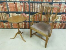 An oak tilt-top side table and an oak chair