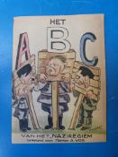 A Dutch children's book Het Naziregiem ABC, soft back, light tanning to the cover, staples not