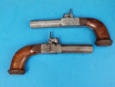 A pair of continental percussion pocket pistols c1840 with engraved locks, octagonal barrels and