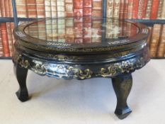 A Chinese lacquer folding table, the top inset with mother-of-pearl and various hardstones to