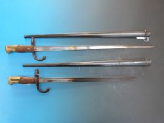 Pair of French late 19th bayonets both marked to blade M're d'armes de St Etienne one May 1878 the