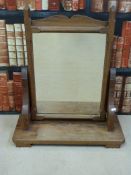A pitch pine swivel table top mirror