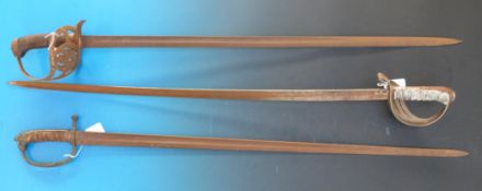 Three various 20thC dress swords