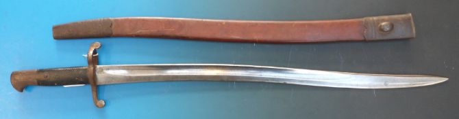A Yataghan bayonet from a Martini Henry rifle, with original leather and metal sheath