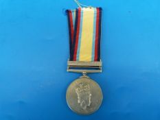 A Gulf War medal awarded to Chief Tech K W Drodge T8076199 RAF, with bar dated 16 Jan to 28 Feb