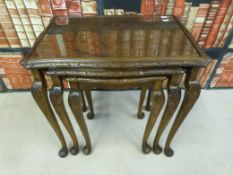 A 19thC mahogany Sutherland table and a nest of tables